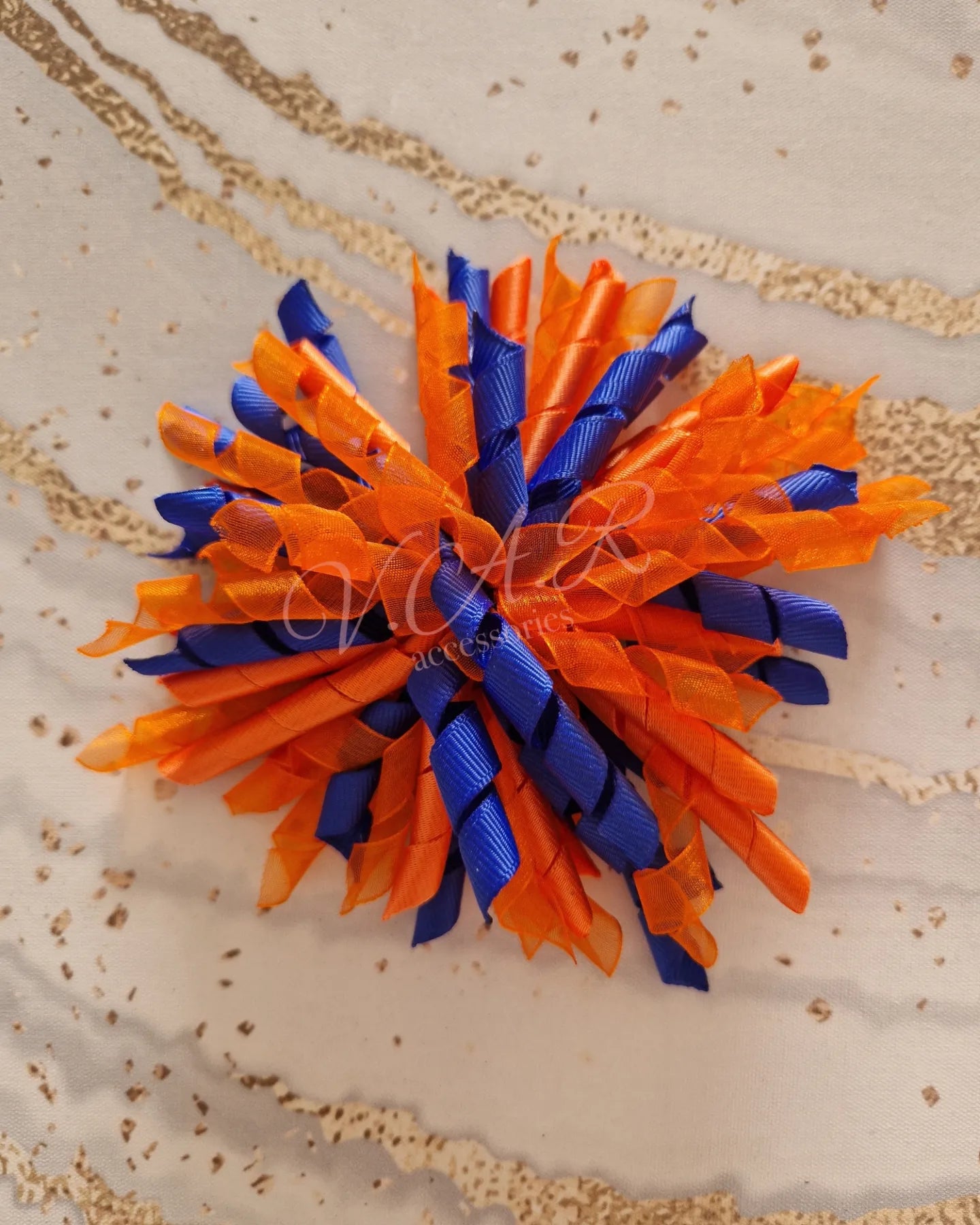 Orange and Blue Korker Bow